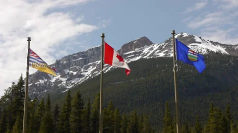 Canada, Banff, Waving Flags Below Mountain Video stock 22693592