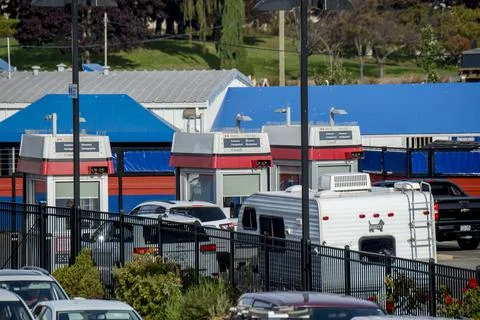 Canada border customs agents checking people entering Canada. Stock Photos