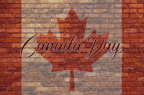 Canada flag on a brick wall with the text Canada Day. Related to  Day july 1. Stock Photos