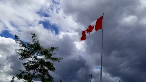 Canada Flag In Cloudy Day Stock Footage 135927249
