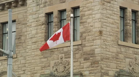 Canada flag on the old building background Stock Footage 55810812