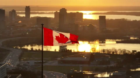 Canada flag with Ottawa skyline in the background Stockbeeldmateriaal 165830138