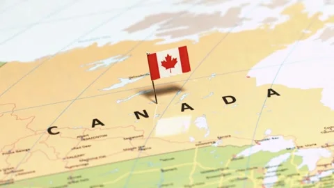 Canada flag pin on world map with slow camera zoom Stock Footage 333485132