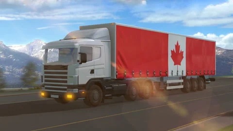 Canada flag shown on the side of a large truck Stock Footage 122097067