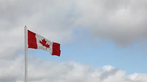 Canada flag waving against cloudy sky Stock Footage 40842641
