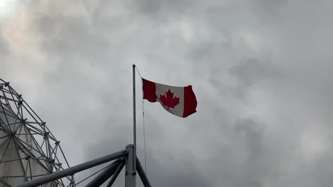 Canada Flag waving Science World building Cloudy day Stock Footage 281704029
