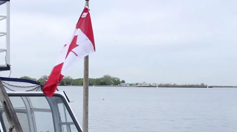 Canada Flag Waving in the Wind on a Boat 库存影片 40808742