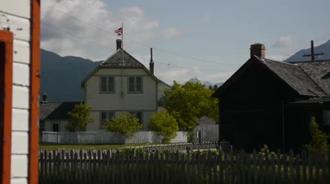 Canada, Fort Steele, Flag Waves from House Stock Footage 22691222