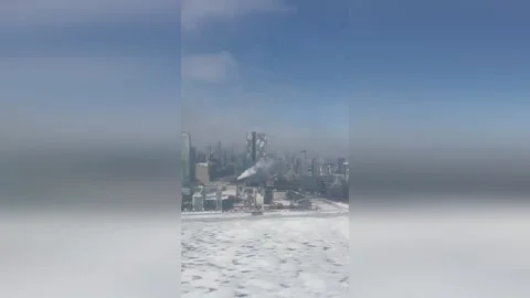 Canada: Frozen Lake Frames Dramatic Plane Landing In Toronto Stock Footage 328536444