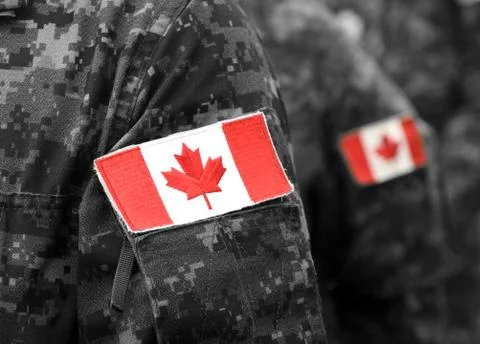 Canada patch flags on soldiers arm. Canadian troops Fotos Stock