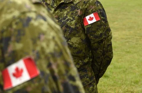 Canada patch flags on soldiers arm. Canadian troops Foto stock