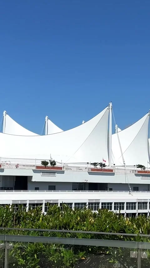 Canada Place is a huge building in the shape of a sailboat, a tourist center and Stock Footage 245000296