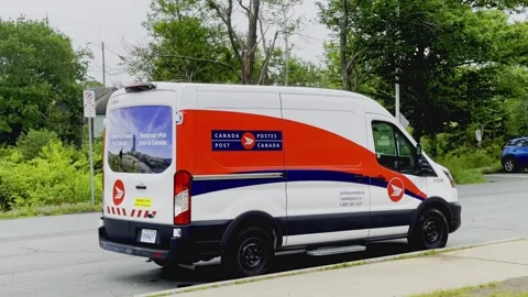 Canada Post delivery van parked. A postal mail truck out for delivery, Halifax Stock Footage 292558511