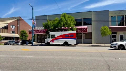 Canada Post Delivery Van Parked On City Street, 4K⁠ Stock Footage 337125757