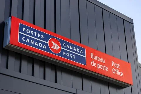 Canada Post distinctive red and blue logo Stock Photos