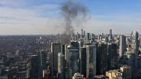 Canada: Rooftop Fire Breaks Out in Downtown Toronto After Possible Propan... Stock Footage 331614609