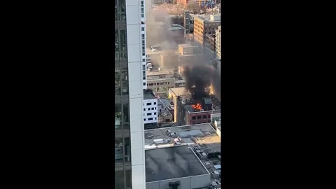 Canada: Rooftop Fire Breaks Out in Downtown Toronto After Possible Propan... Stock Footage 331758544