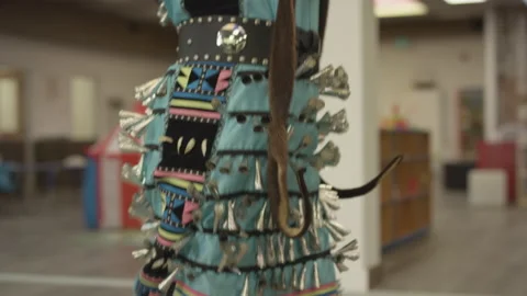 Canadian aboriginal dancer slow motion bells on dress Stock Footage 166163111