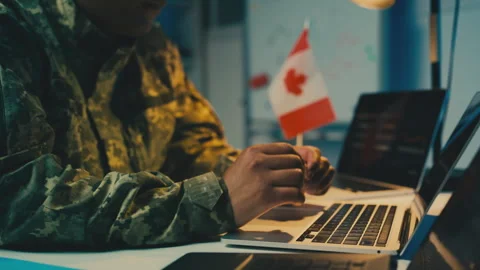 Canadian army officer working on laptop ... | Stock Video | Pond5