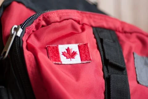 Canadian flag on backpack Stock Photos