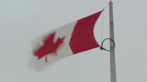 Canadian flag blowing in the wind storm Stock Footage 37274532