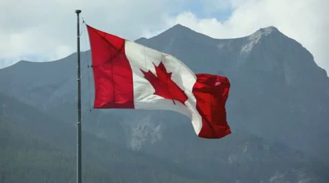 Canadian flag at the canmore nordic center, alberta canada Stock Footage