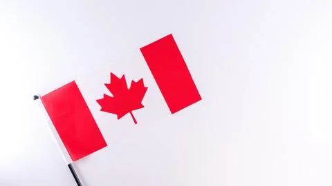 Canadian flag featuring a red maple leaf on a white background, symbolizing Stock Photos