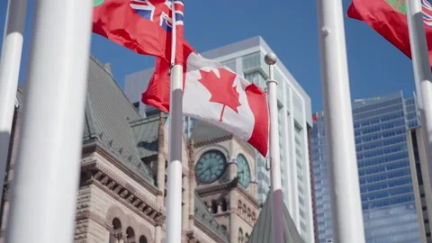 Canadian Flag Waves Above Old Toronto City Hall Clock Tower Slow Motion Stock Footage 339080653