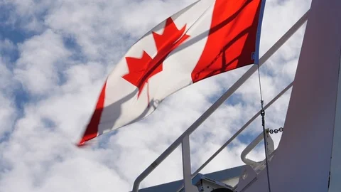Canadian Flag Waves in Wind on a Ship Red Maple Leaf Vídeo Stock 119706240
