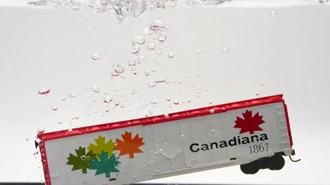 Canadian train car with maple leaf falling in water isolated on white model  Stock Footage 219442860