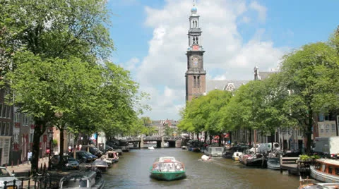 Canal boats at Westerkerk, Amsterdam Stock Footage