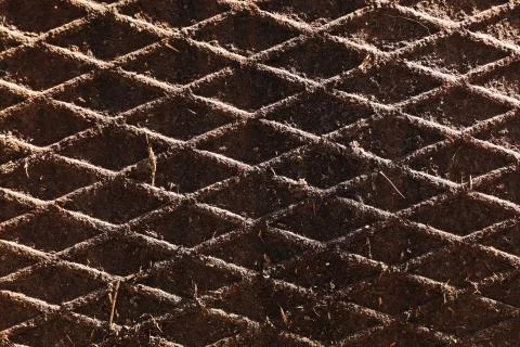 Canal cover surface texture. Rusty iron square pattern. Rusty metal square Stock Photos