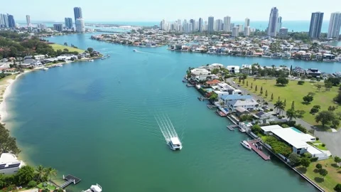 Canal ferry touring past million dollar ... | Stock Video | Pond5