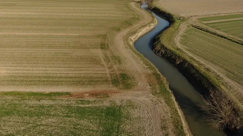 Canal in the fields Stock Footage 119817847