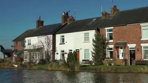 Canal side cottages deep blue sky Trent and Mersey rural Stock Footage 46410017