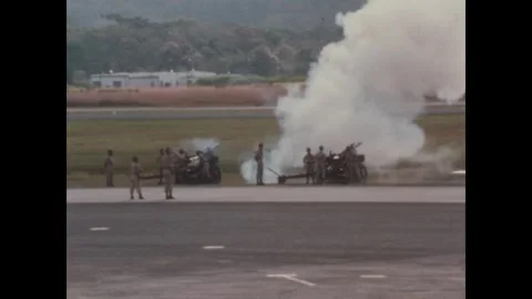 CANAL ZONE, PANAMA - 1969: Split-trail carriage - Saluting gun fires by runway Stock Footage 344911622