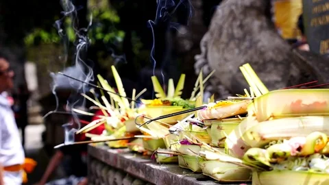 Canang offerings left by Hindu devotees Stock Footage 69708062