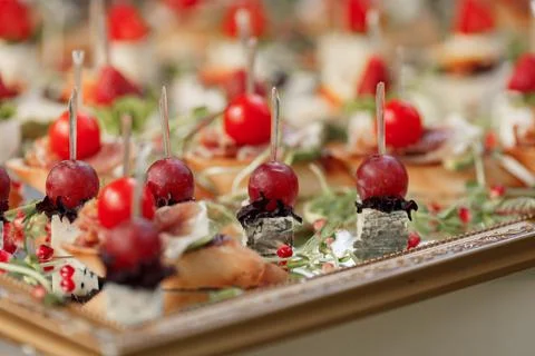 Canape appetizers with grape and DorBlu cheese Stock Photos