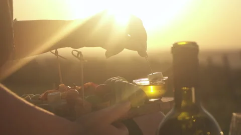 Canape With Cheese .Sliced fruit on view of the sunrise, sunset.Slow Motion. Stock Footage 153861836