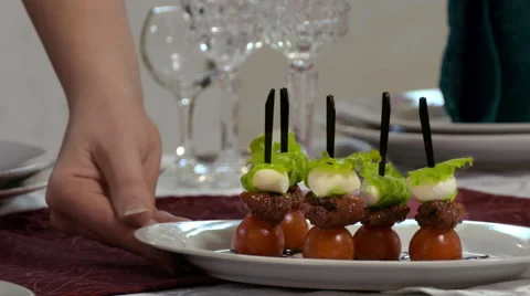 Canape With Cherry Tomatoes And Mozzarella Video stock 61779960