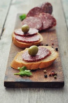 Canape with salami Foto stock