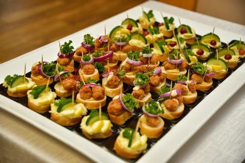 Canape selection on slate platter Stock Photos