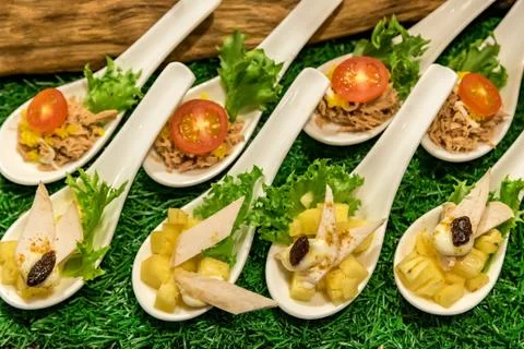 Canape on spoon Stock Photos