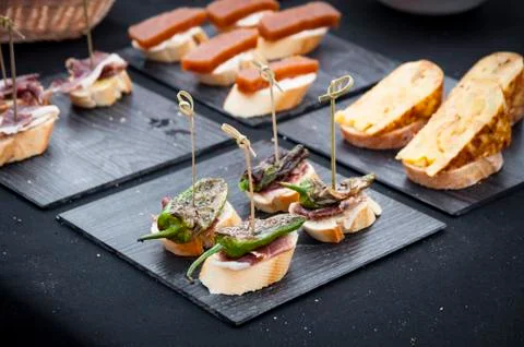 Canapes with different ingredients Stock Photos