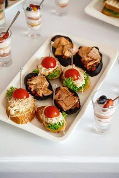 Canapes on the festive table Stock Photos