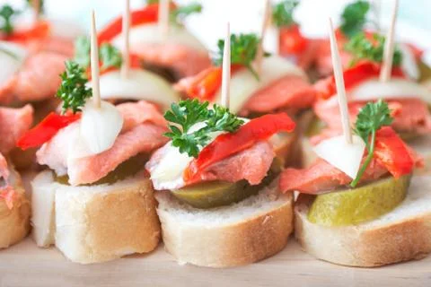 Canapes with fish Stock Photos