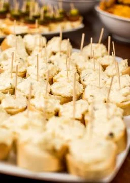 Canapes of garlic Stock Photos