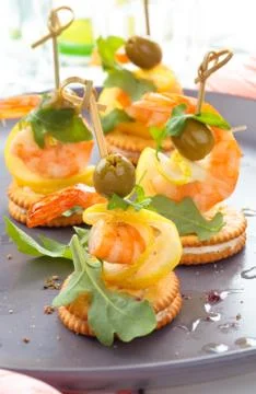 Canapes with prawns. Stock Photos