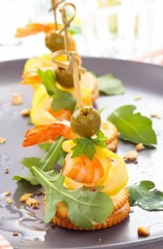Canapes with prawns. Stock Photos