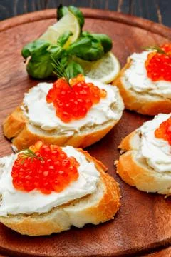 Canapes with red caviar Stock Photos